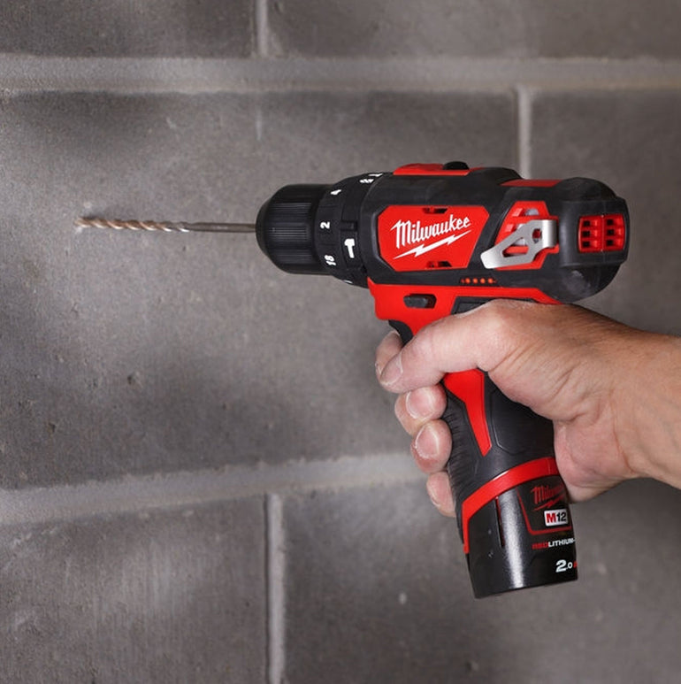 Milwaukee M12BPD-0 12V Combi Hammer Drill with 1 x 2.0Ah Battery Charger & Bag